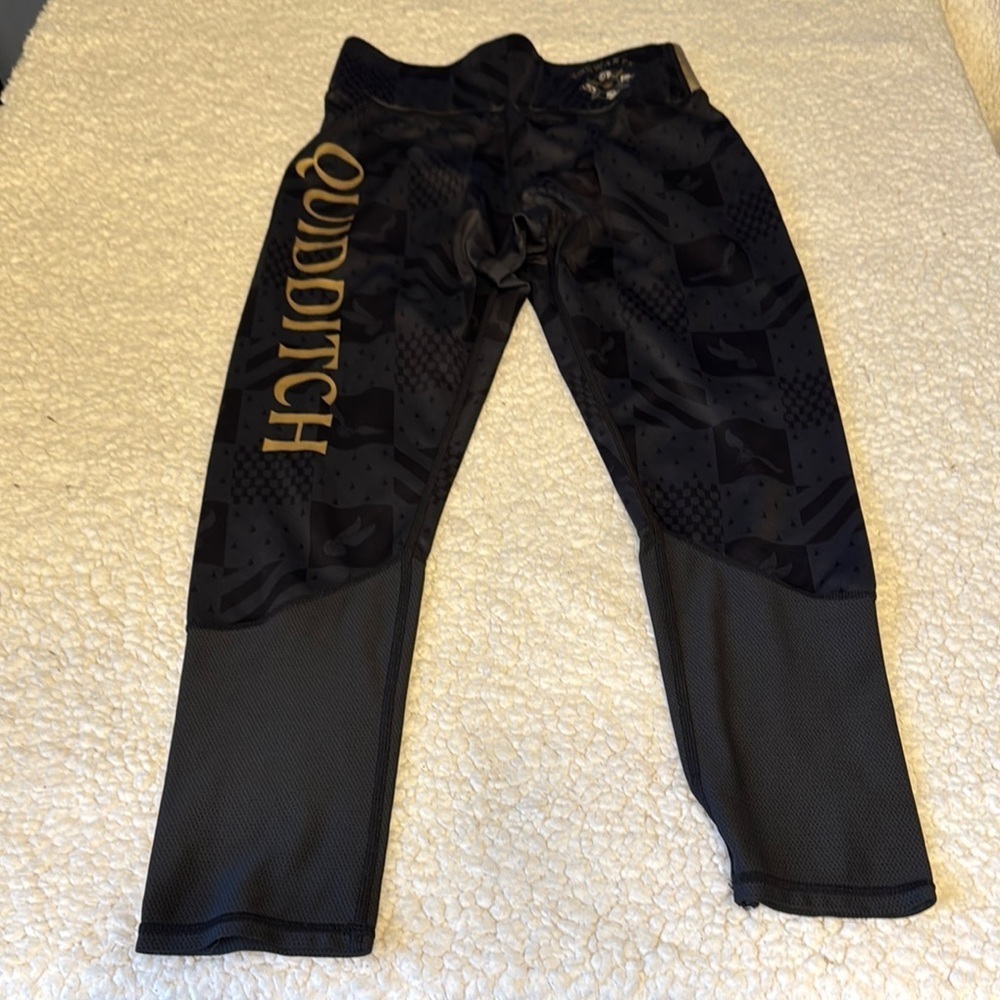 Warner Bros Black and Gold Leggings with Tapered Design